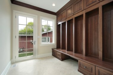 Mud room with wood cabinet clipart
