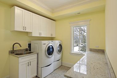 Laundry room in luxury home clipart