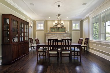 Dining room with stone fireplace clipart