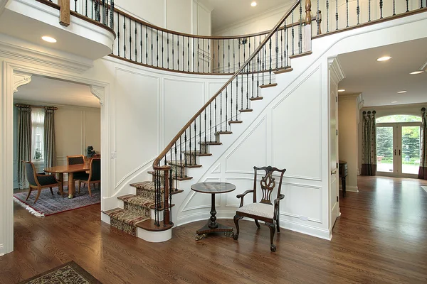 Foyer with curved staircase — Stock Photo, Image