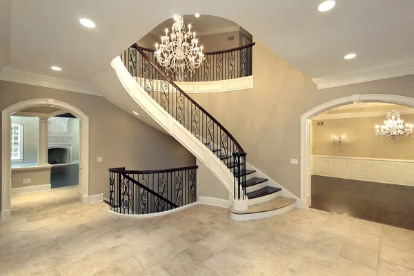 Foyer with curved stairway — Stock Photo, Image