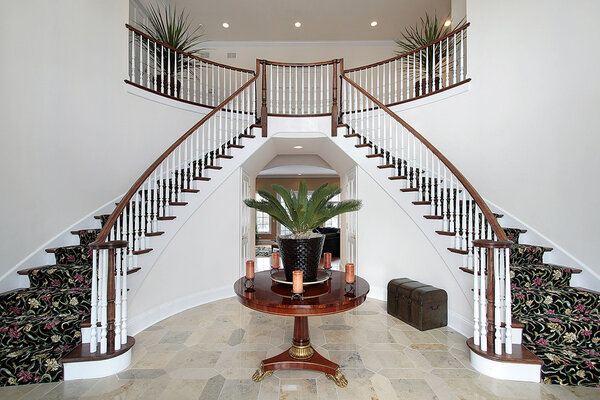 Modern foyer with double staircase