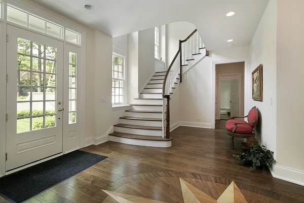 Foyer with staircase and design on floor — Stock Photo, Image
