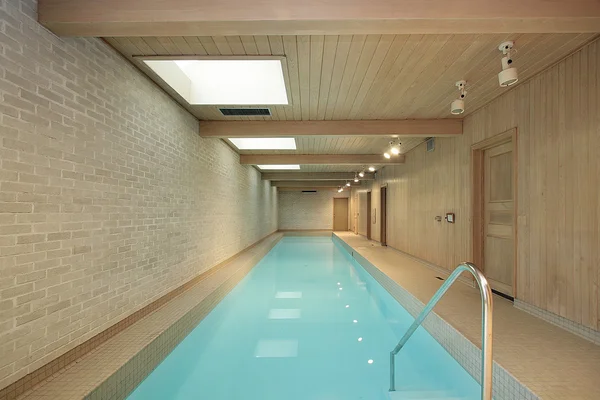 Long indoor swimming pool — Stock Photo, Image
