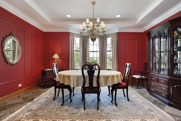 Dining room with red walls — Stock Photo, Image