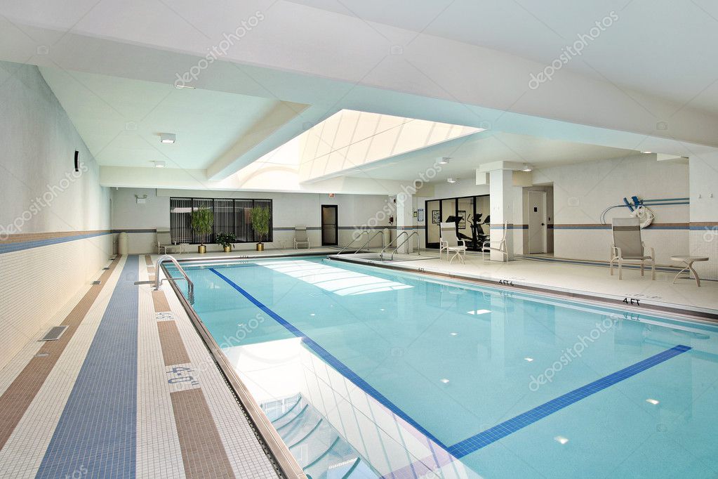 Swimming pool in condominium building — Stock Photo © lmphot 8689006