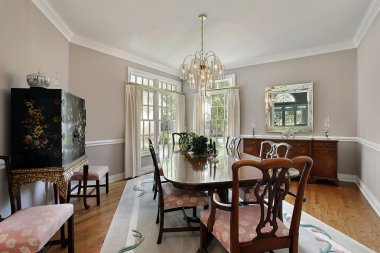 Dining room with gray carpet clipart