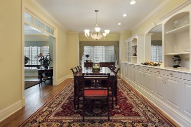 Dining room with white cabinetry clipart