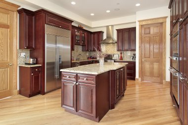 Kitchen with cherry wood cabinet clipart