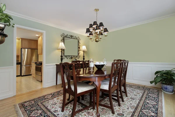 Dining room with kitchen view — Stock Photo, Image