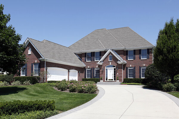 Luxury brick home with three car garage