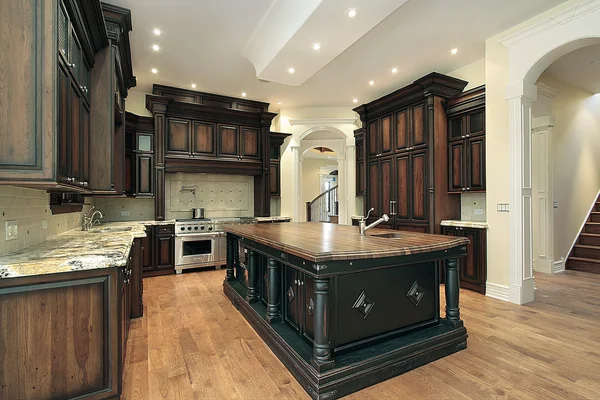 Kitchen with dark cabinet — Stock Photo, Image