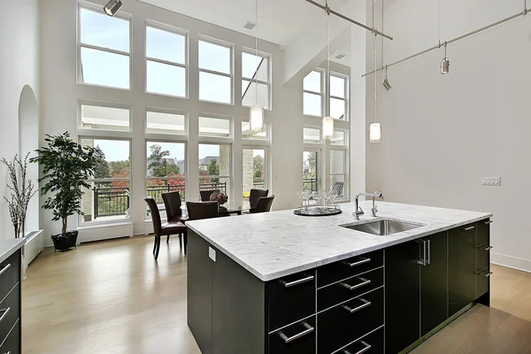 Modern kitchen with two story windows — Stock Photo, Image