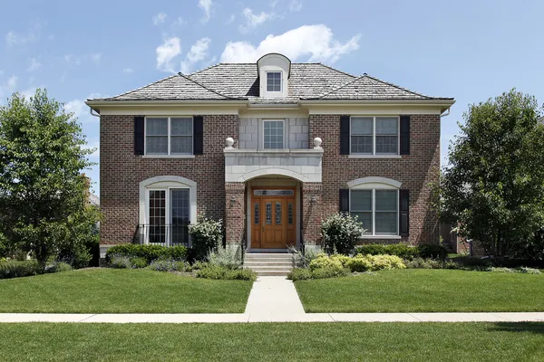Brick home with front archway Stock Image