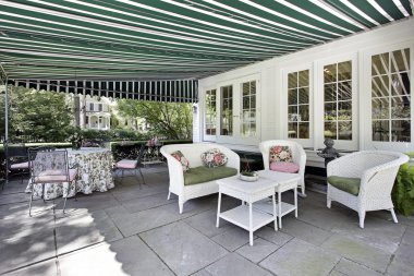 Patio with green awning clipart