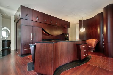 Kitchen with cherry wood cabinetry clipart