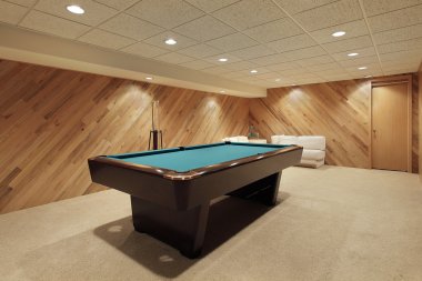 Pool table in basement clipart