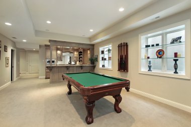 Pool and kitchen in basement clipart