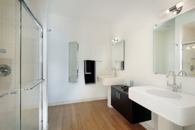 Master bathroom in condominium clipart
