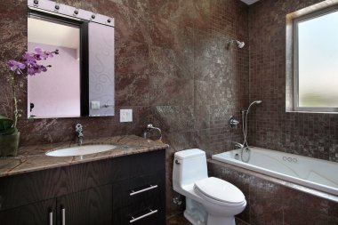 Powder room with granite walls clipart