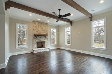 Family room with ceiling wood beams clipart