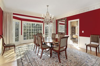 Dining room with red walls clipart