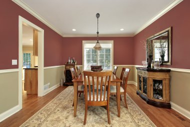 Dining room with two toned walls clipart