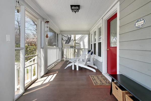 Porch with red door — Stock Photo, Image