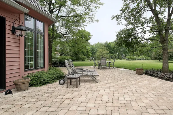 Brick patio with furniture — Stock Photo, Image