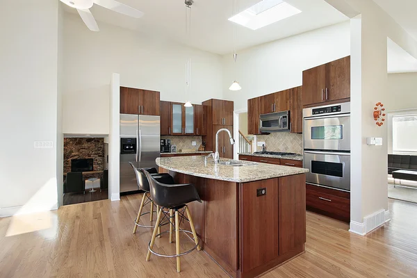 Modern kitchen with granite island — Stock Photo, Image
