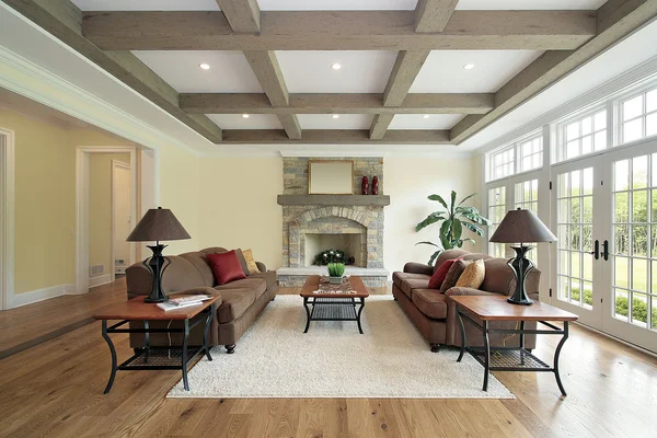 Family room with wood ceiling beams — Stock Photo, Image