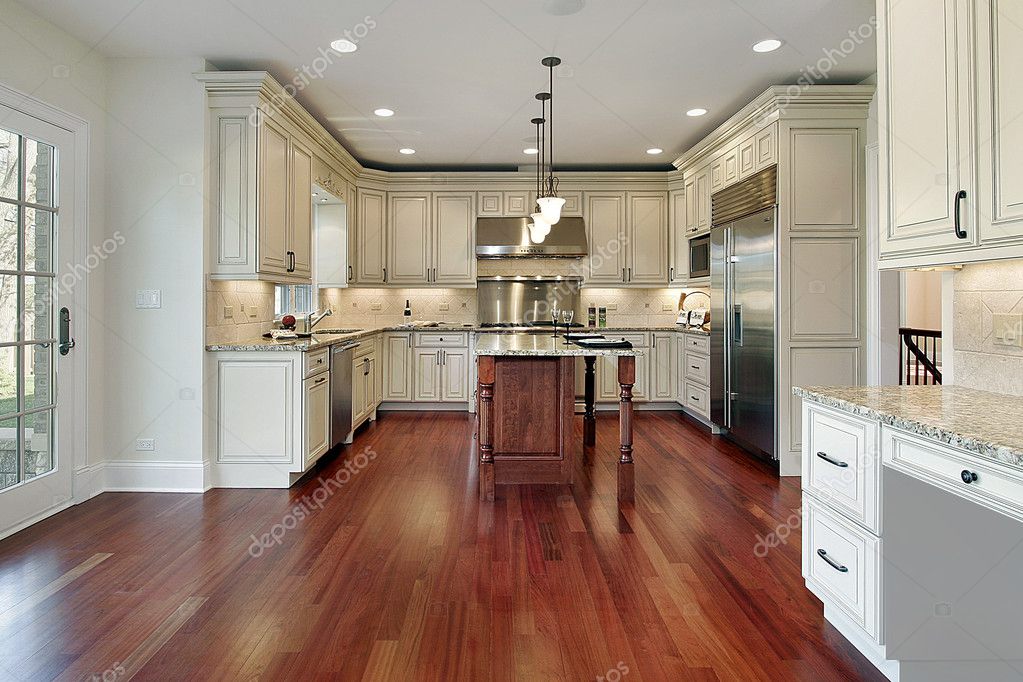 Kitchen with cherry wood floor — Stock Photo © lmphot #8701430
