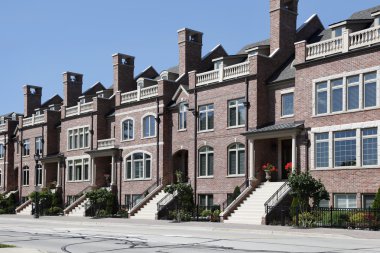 Three story brick town houses clipart