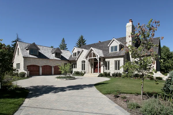 Luxury stone home in suburbs — Stock Photo, Image