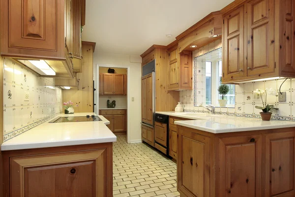 Country kitchen with wood cabinets — Stock Photo, Image
