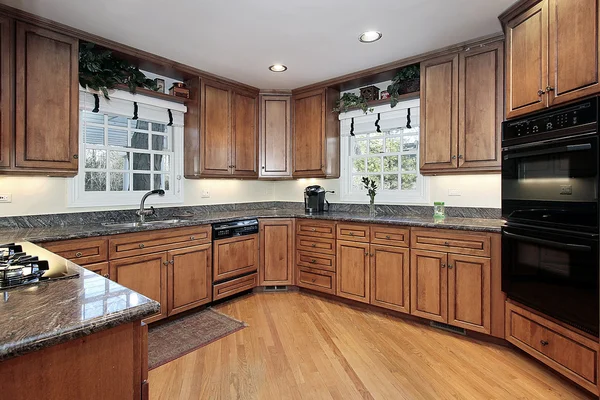 stock image Modern wood paneled kitchen