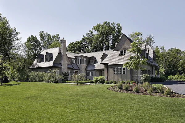 Luxury home with cedar shake roof — Stock Photo, Image