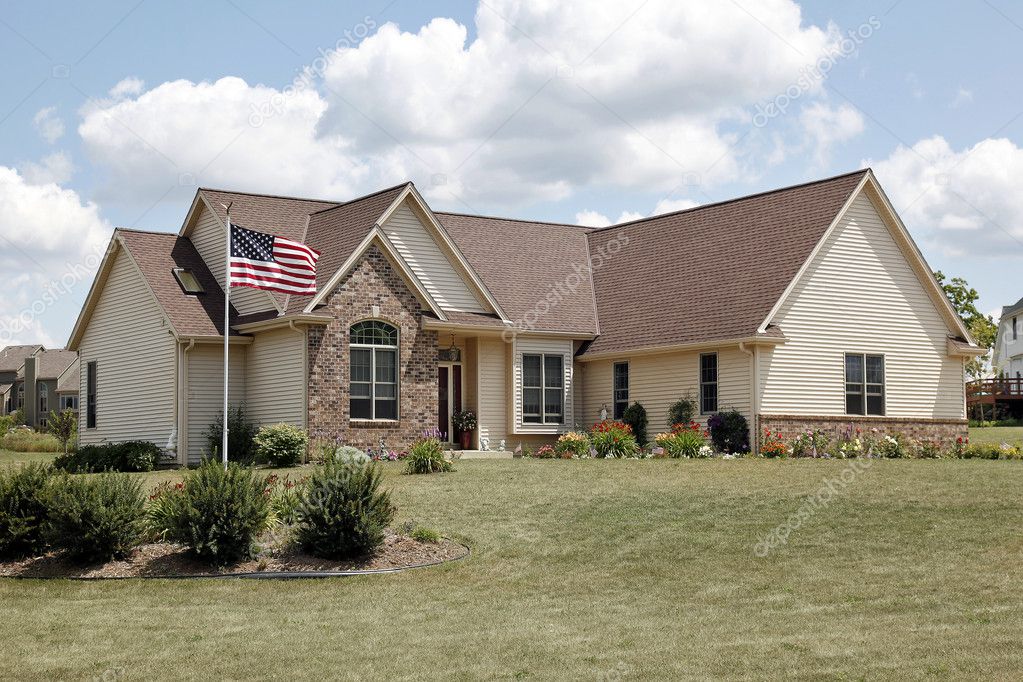 Brick home with American flag