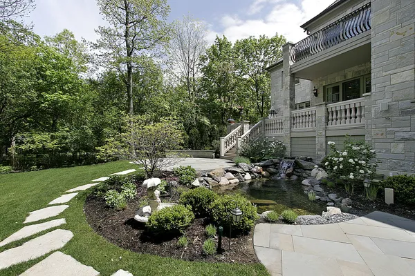 Back yard with stone patio — Stock Photo, Image