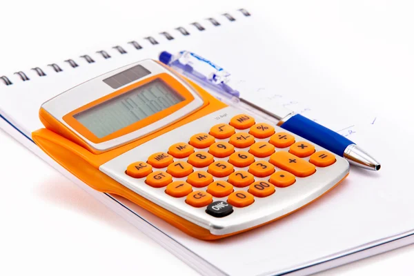 Calculadora e caneta Fotografias De Stock Royalty-Free