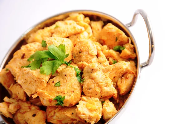 Kyckling curry i silver serveringsfat Stockfoto