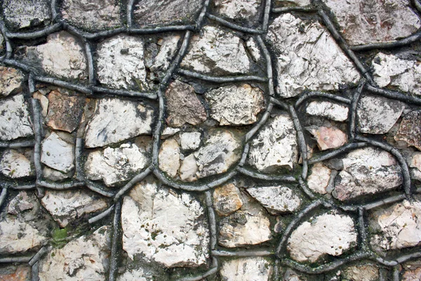 Parede feita de rochas — Fotografia de Stock