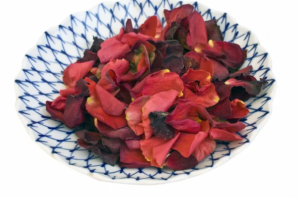 Plate with rose petals — Stock Photo, Image