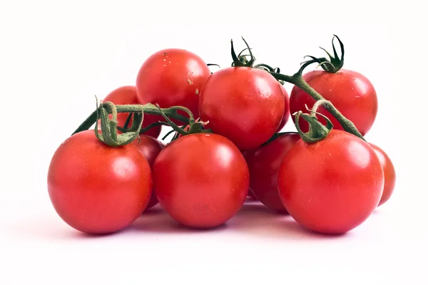 Tomates cereja isolados — Fotografia de Stock