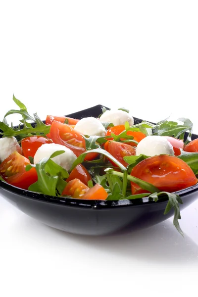 Mozzarella und Tomaten lizenzfreie Stockbilder