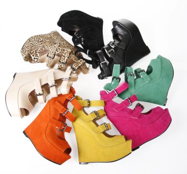 Multicolored wedges shoes in circle clipart