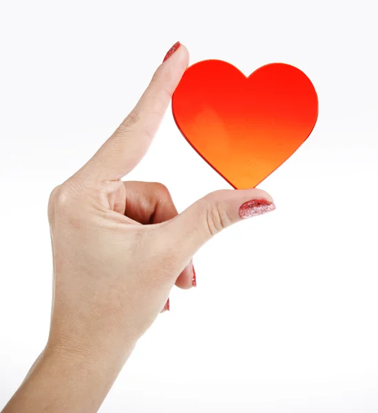 Symbol červené srdce v ruce — Stock fotografie