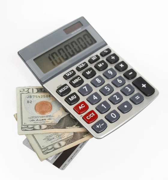 Калькулятор и деньги — стоковое фото