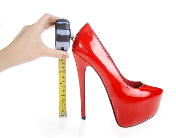 Red shoe and tape measure — Stock Photo, Image