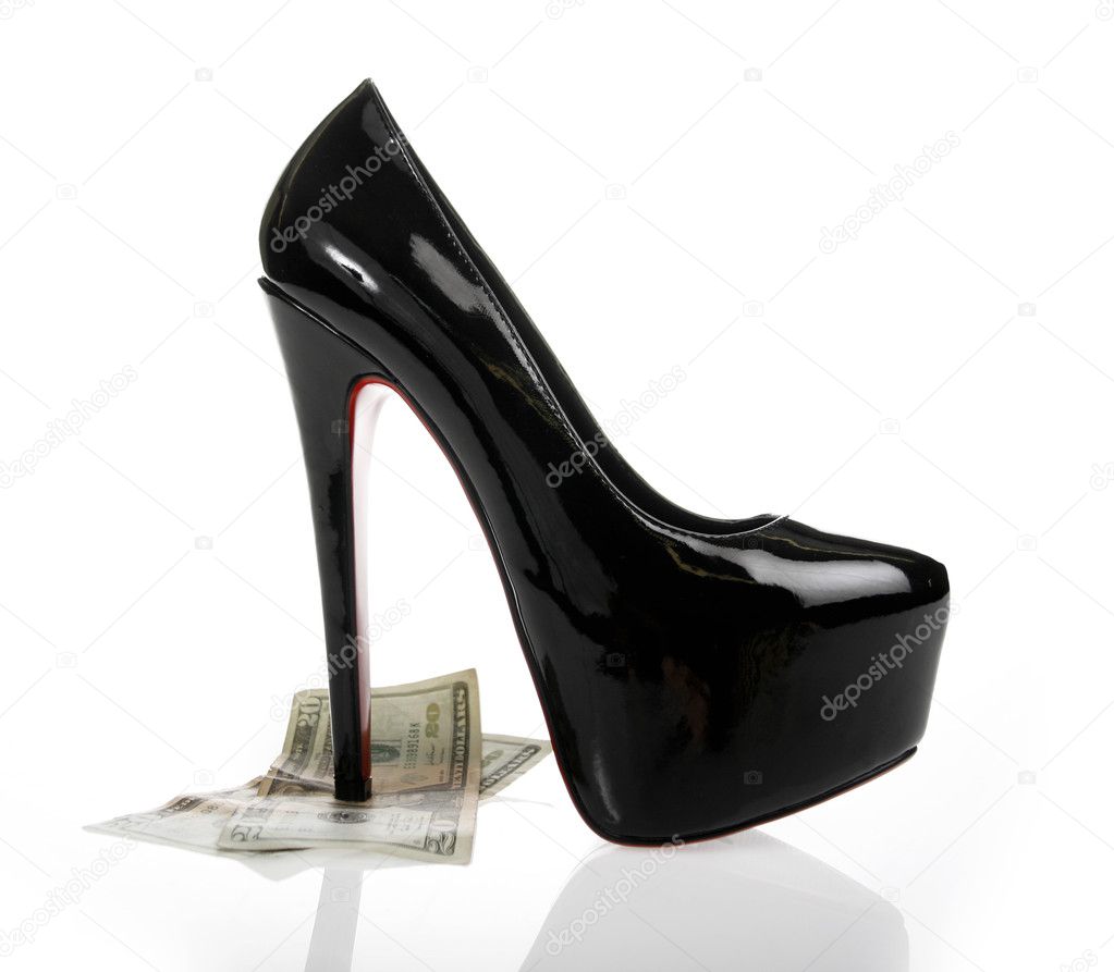Money under black heel
